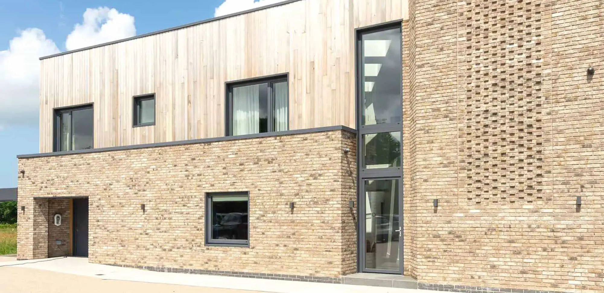 Glass modern entrance door in a PassivHaus new build.