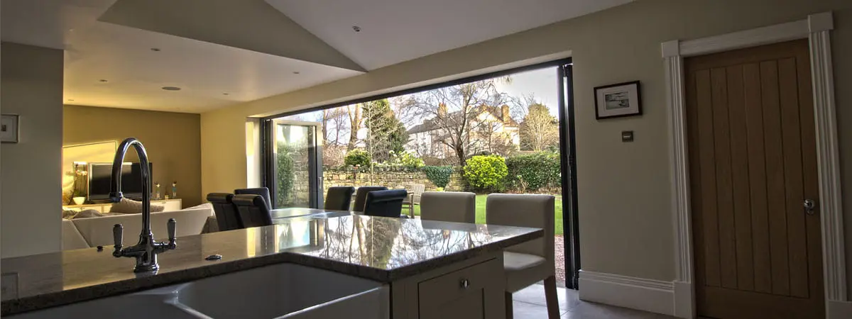 Open plan living room with Centor bi-fold doors.