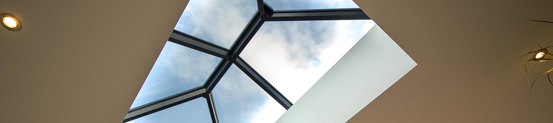 Double modern grey aluminium roof lanterns installed in Wirral, featuring modern glazing bars and triple glazing.