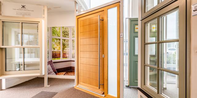 Double, triple glazed European-engineered Oak Bako door in the showroom, contemporary timber