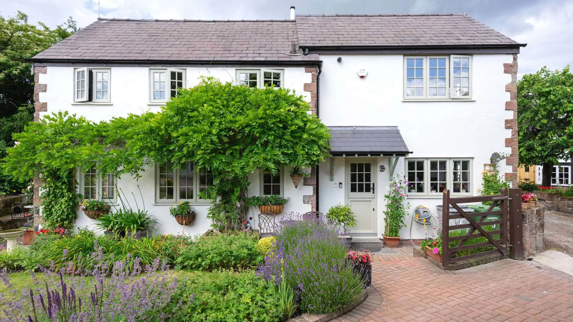 Straight on view of this family home featuring a new double glazing installation in Wirral.