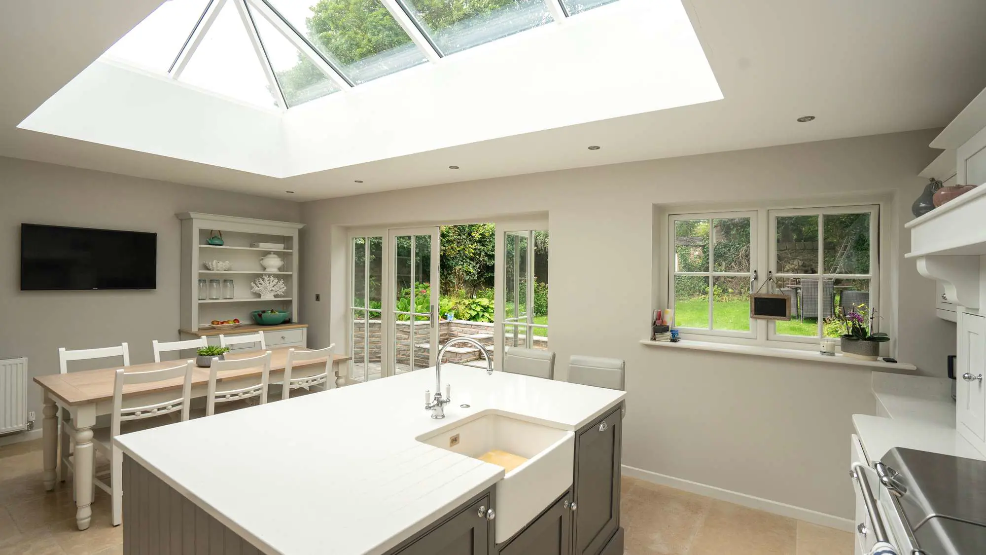 In-frame shaker kitchen in orangery.