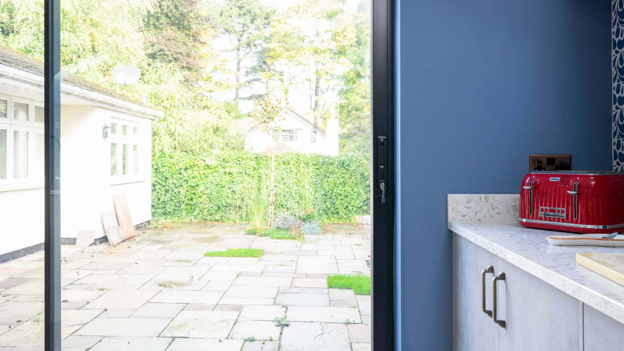 Close up of the sliding door detail and slim glazing bars.