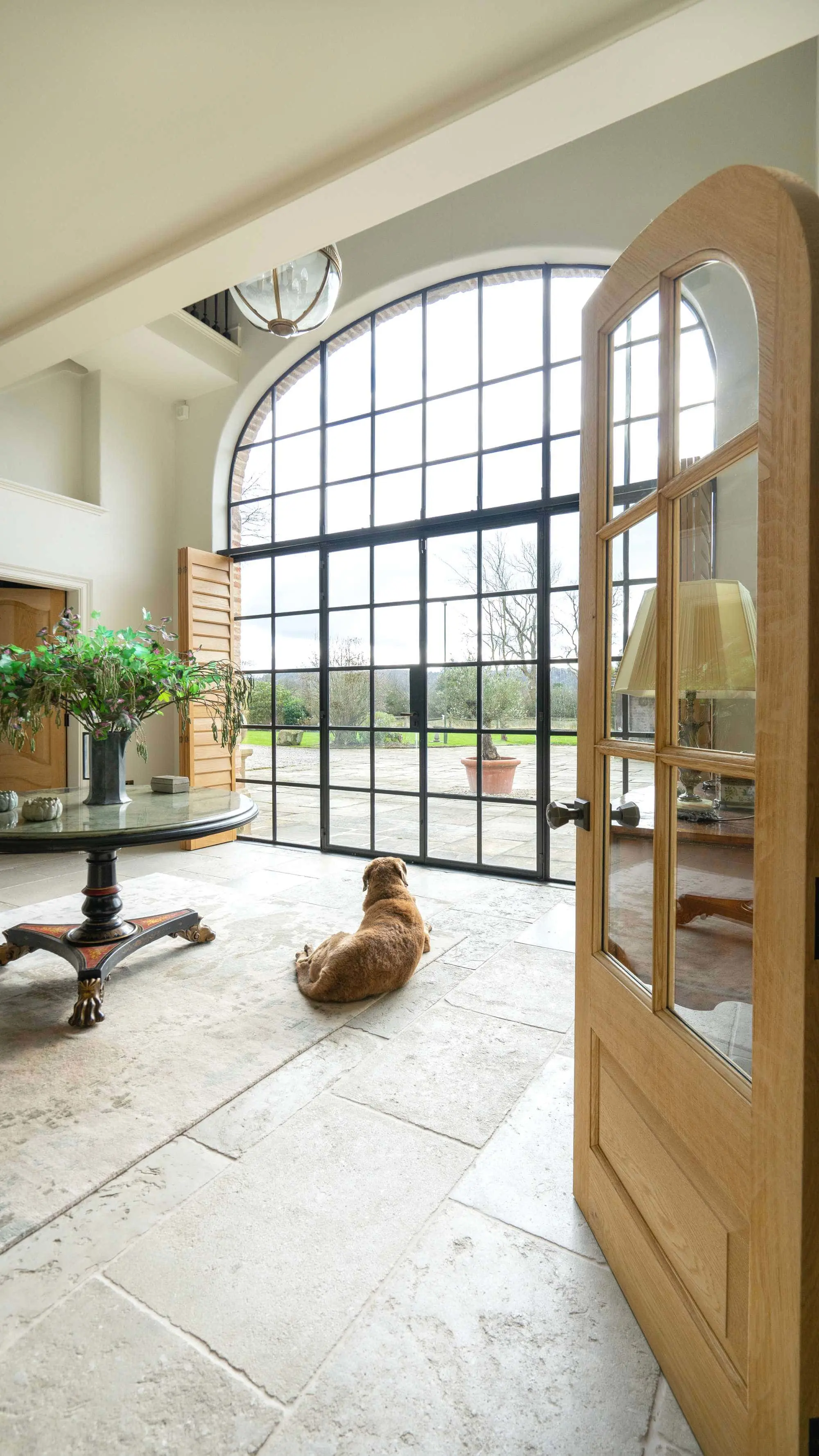 Internal view of the large arched Crittall screen, a real feature of the home.