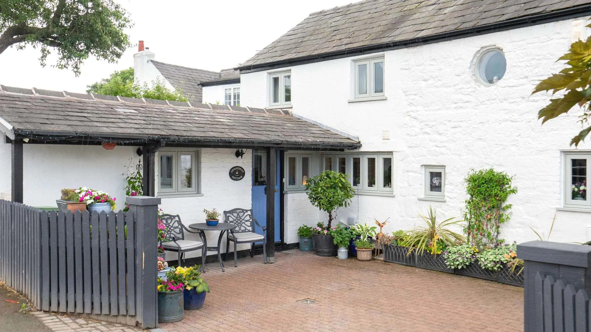 Agate Grey Window installation featuring flush timber alternative windows.