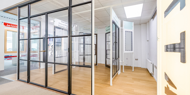 Large Crittall internal door in the showroom with Internorm in background 