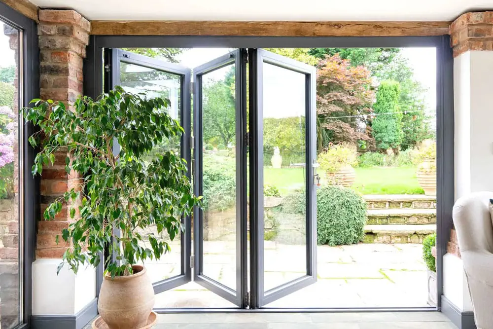 Aluminium bi-folding doors in RAL 7016