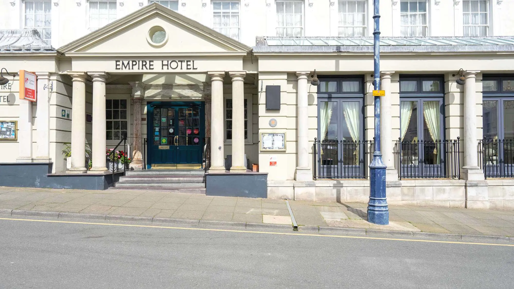 Installation of the alu-clad French doors with top lights at The Empire Hotel llandudno