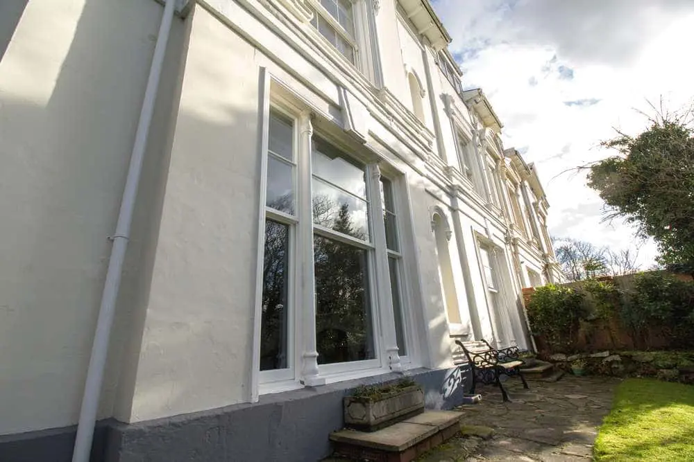 Close up of triple sash window installation.