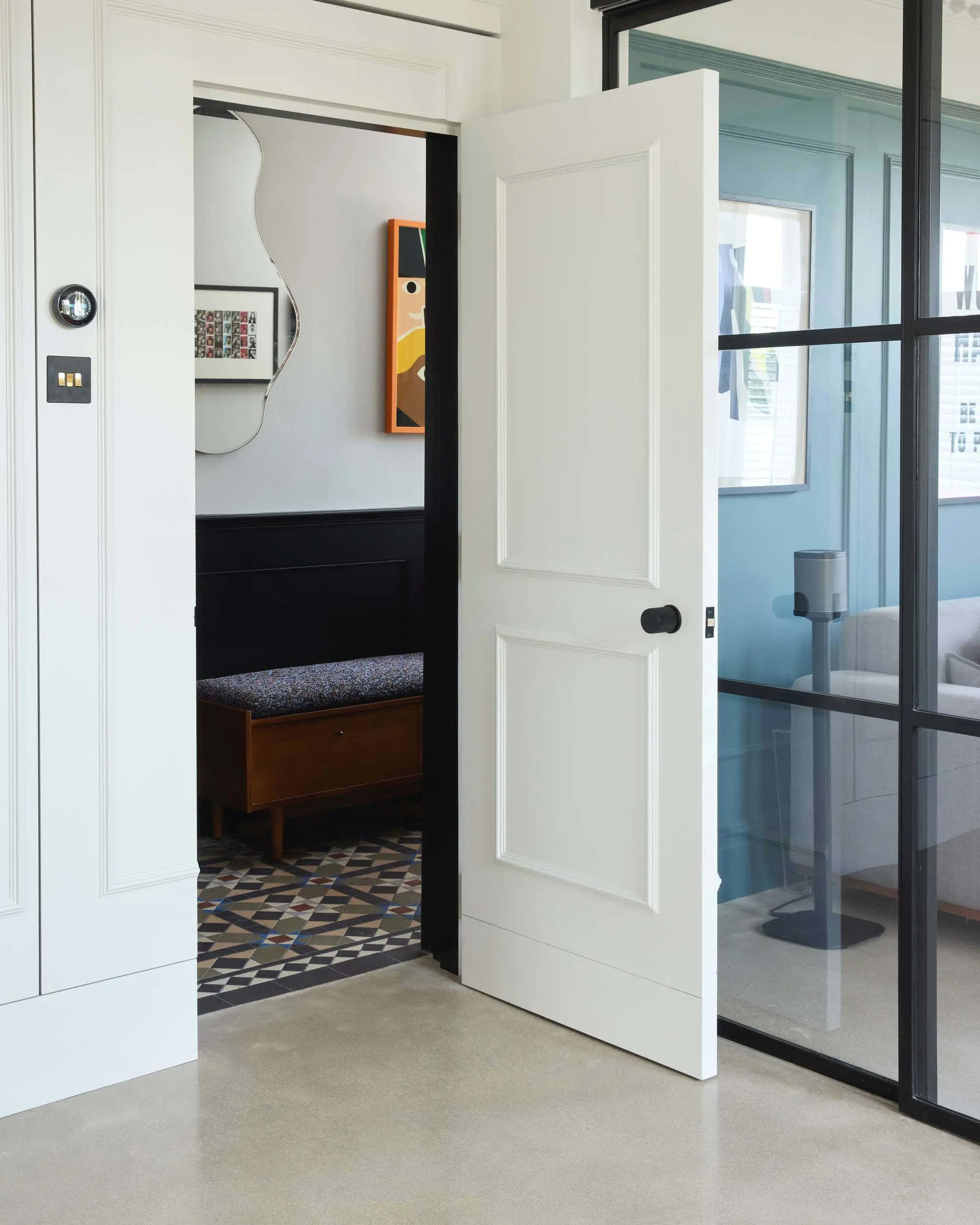 Interior door with the Crittall glazing bars in the backdrop.