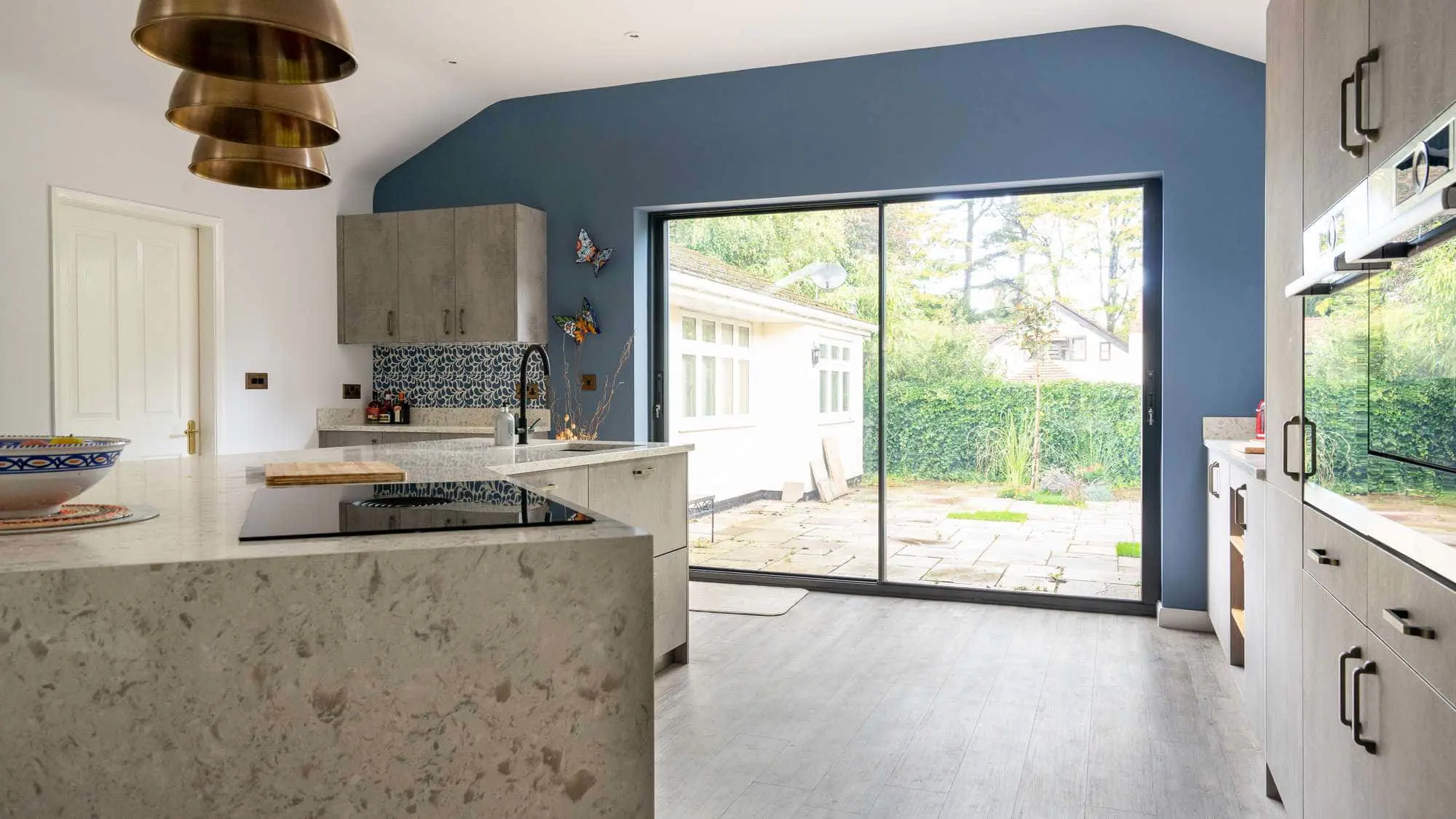 Main view of the kitchen leading onto the sliding door.