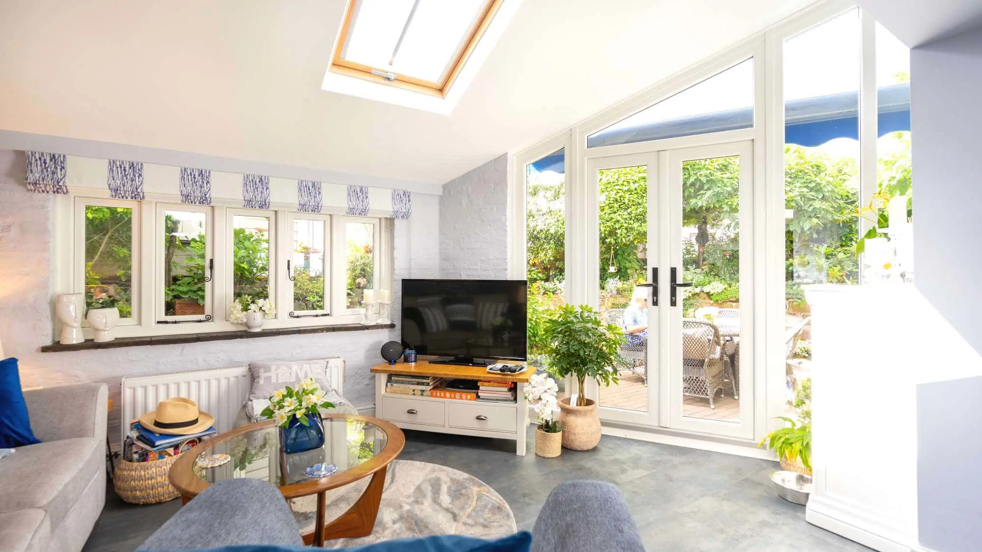 Internal shot of Pitched timber alternative French door with side lights and top light.