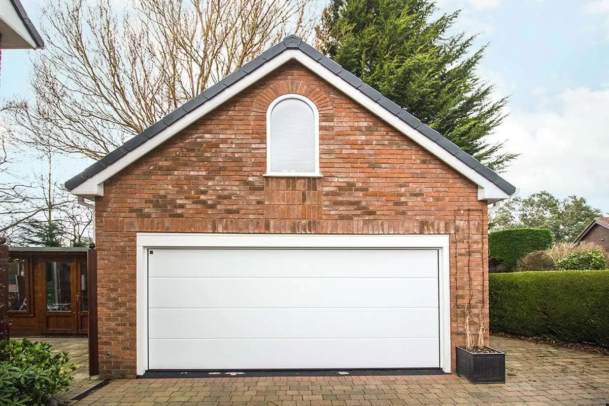 Garage picture highlighting replaced arched window.